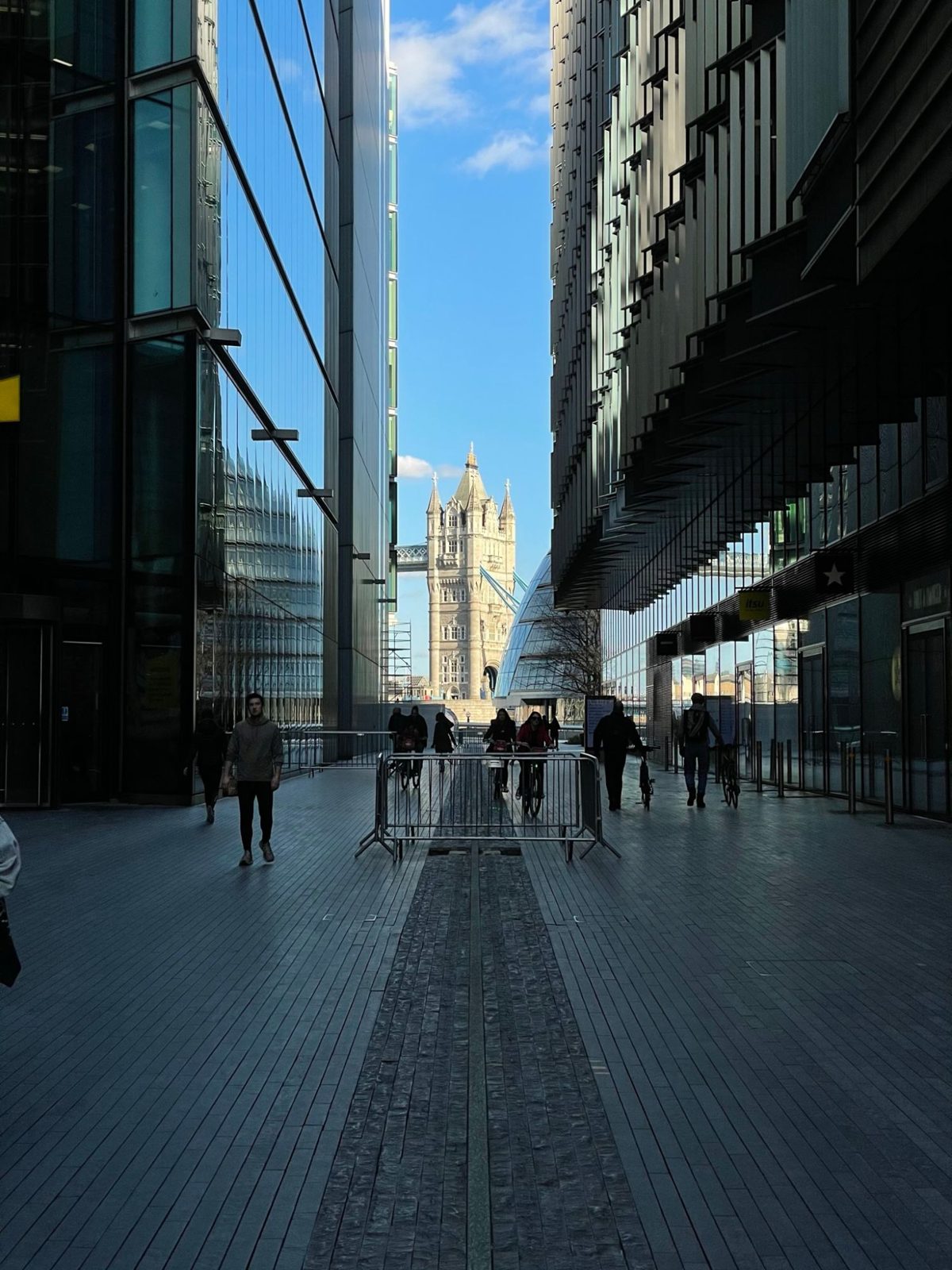 Tower Bridge framed between two glass buildings